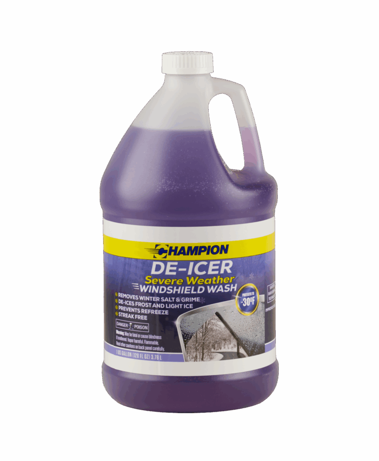 A clear bottle of Champion De-Icer Severe Weather Windshield Wash filled with purple liquid. The bottle's label explains the purpose of the product, "removes winter salt and grime, de-ices frost and light ice, prevents refreeze, streak free".