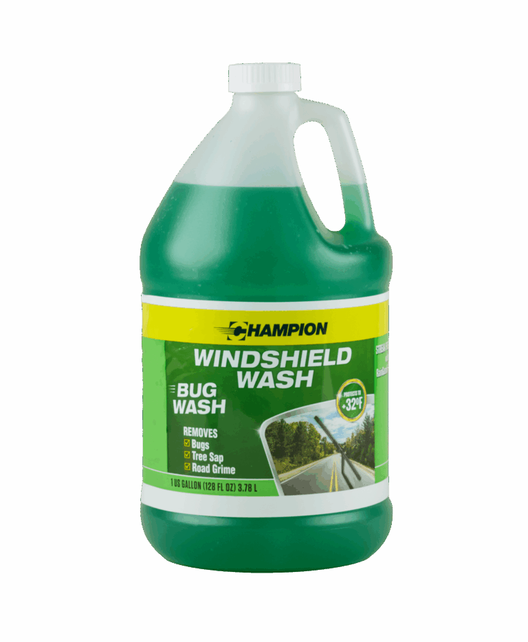 A bottle of Champion Windshield Wash filled with green liquid. The label says, "Removes bugs, tree sap, and road grime".